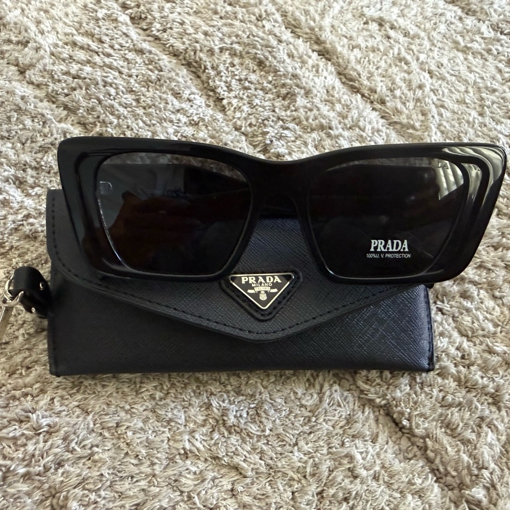 Prada Black Women's Cat-Eye Sunglasses with Silver Logo Accent
